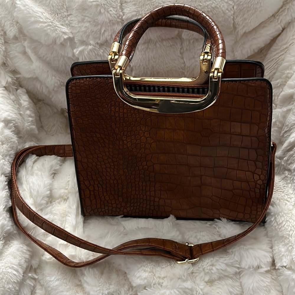Brown faux crocodile leather purse with handles adjustable strap.